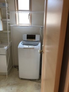 富山市、マンション内の不用品回収洗濯機写真